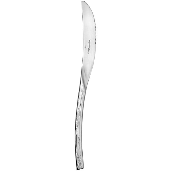 A Chef & Sommelier stainless steel dinner knife with a curved silver handle and silver blade.