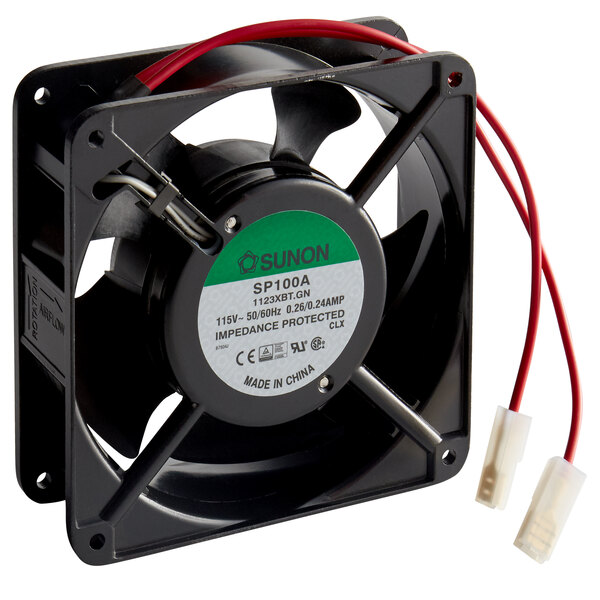 A black Carnival King fan motor with red wires.