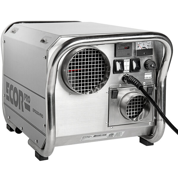 A stainless steel Ecor Pro desiccant dehumidifier with a black hose and dials.