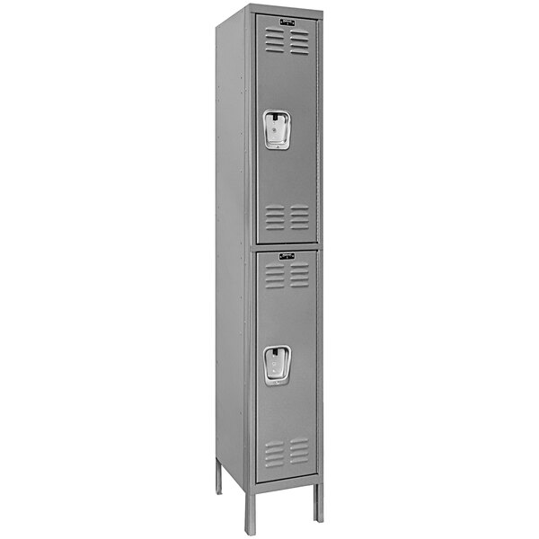 A gray Hallowell metal locker with two doors.