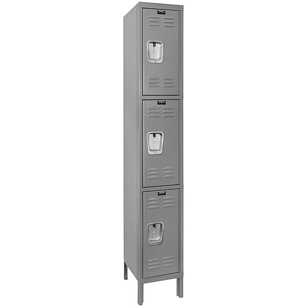 A close-up of a gray Hallowell locker with recessed handles.