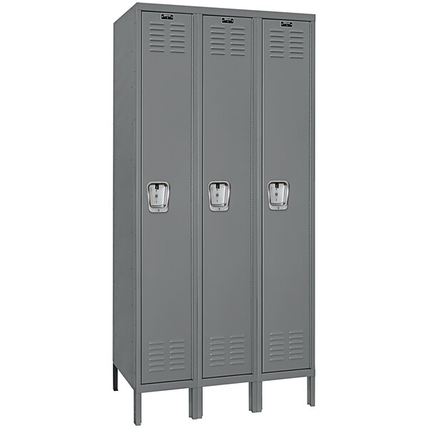 A group of Hallowell gray steel lockers with recessed handles.