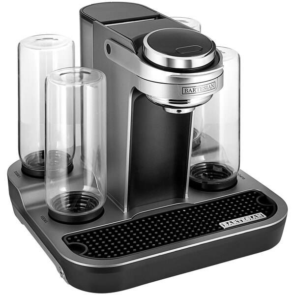 A black and silver Bartesian cocktail machine with four cylinders on top.