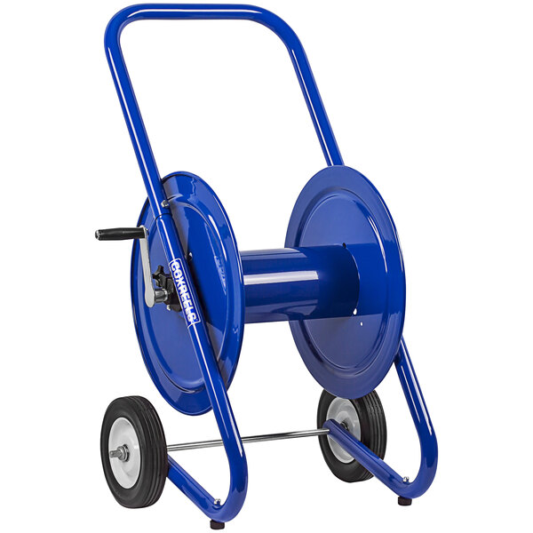 A blue Coxreels dolly-mounted hose reel with wheels.