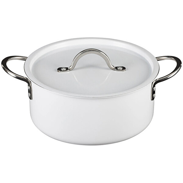 A white Bon Chef sauce pot with a metal handle and lid.