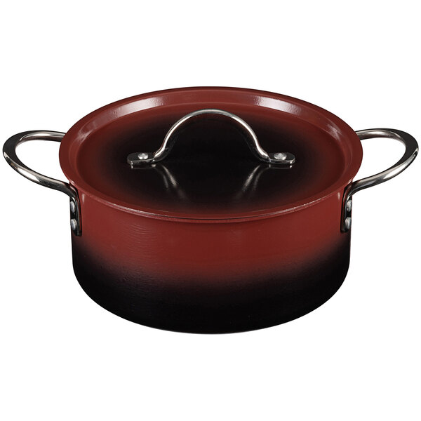 A Bon Chef ombre merlot sauce pot with a handle and cover.