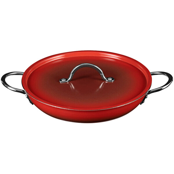 A Bon Chef ombre crimson red saute pan with a handle and lid.