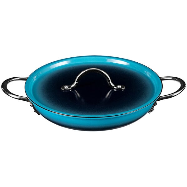 A Bon Chef Country French Ombre Caribbean Blue saute pan with a handle and lid.