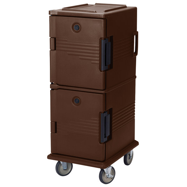 A dark brown plastic Cambro food pan carrier with heavy-duty casters and security package.