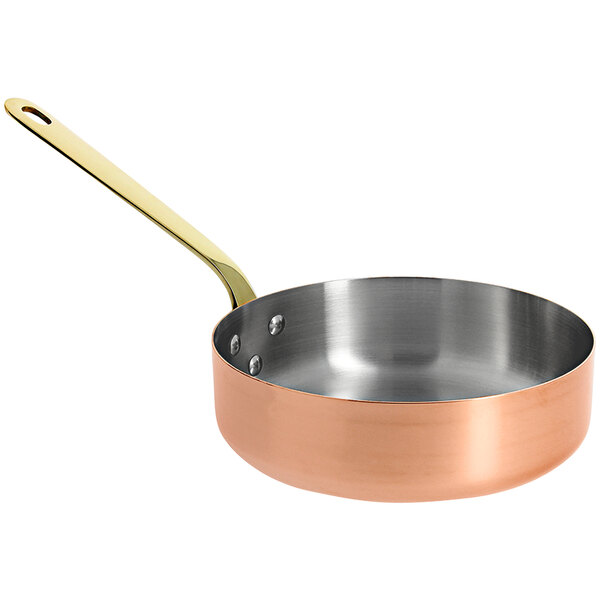 A de Buyer copper saute pan with a handle.