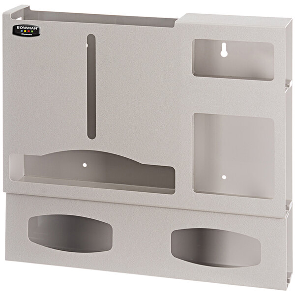 A beige plastic wall mount with two compartments for glove boxes.