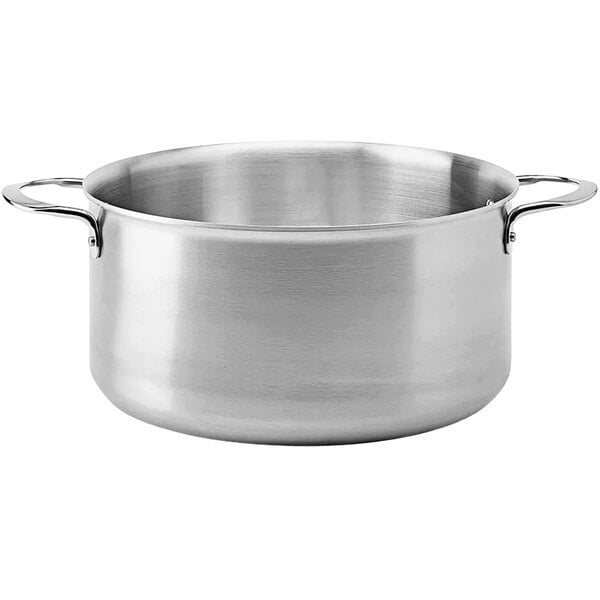 A silver de Buyer stainless steel sauce pot with handles.