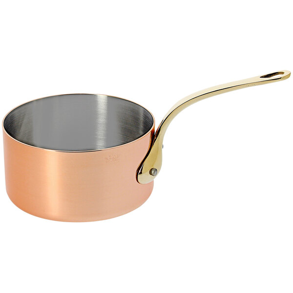 A de Buyer copper saucepan with a handle.