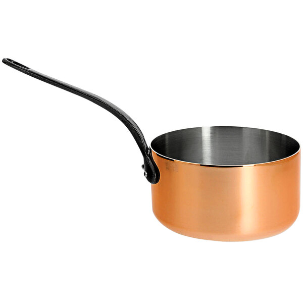 A de Buyer copper sauce pan with a black handle.