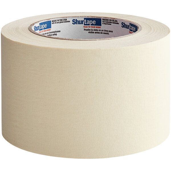 A roll of Shurtape natural masking tape with a blue label.