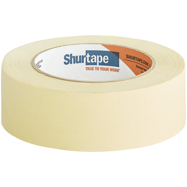 A roll of Shurtape light yellow industrial grade masking tape with a label.