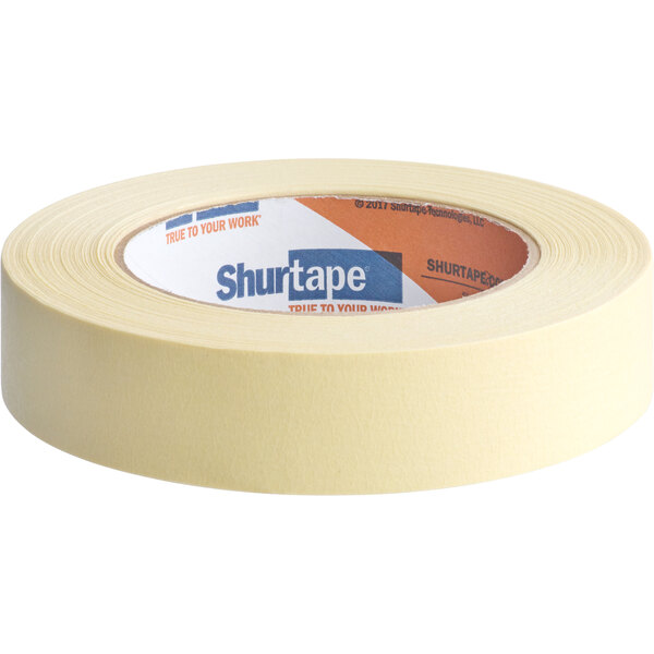 A roll of Shurtape industrial grade masking tape with a yellow label.