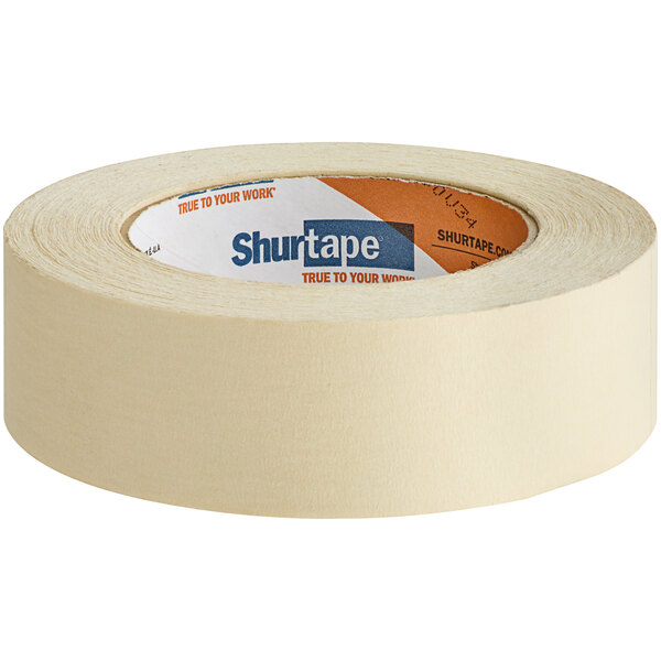 A roll of Shurtape natural utility grade masking tape with a label.