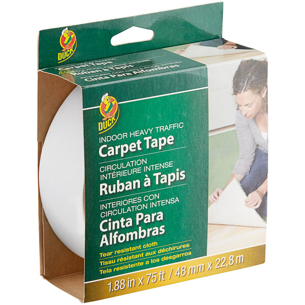 A green box of Duck Tape carpet tape with white text and a white circle on the box.