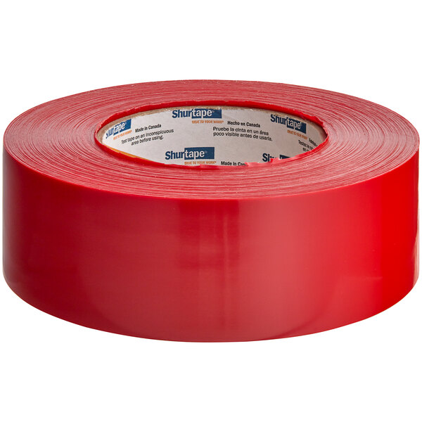 A roll of red Shurtape PE 555 stucco masking tape.