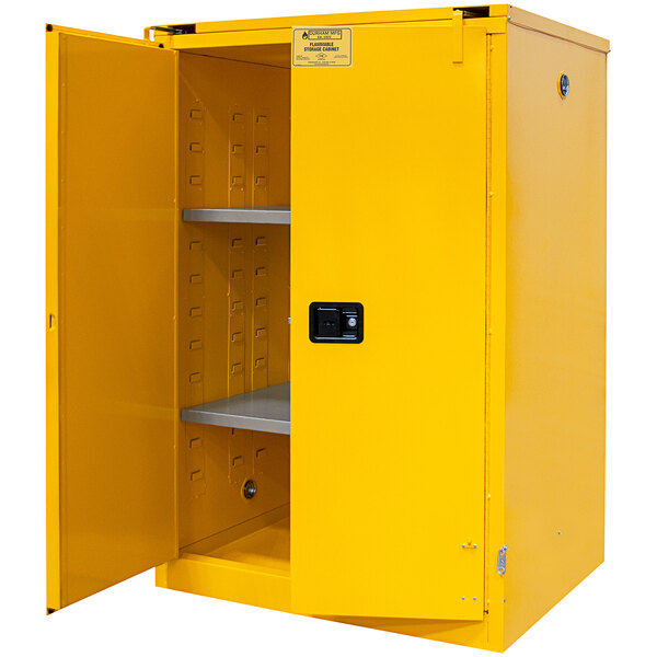 A yellow Durham Mfg steel flammable safety cabinet with doors open.