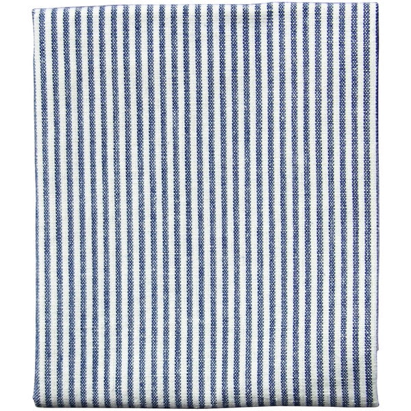 A close-up of a blue and white striped Garnier-Thiebaut cloth napkin.