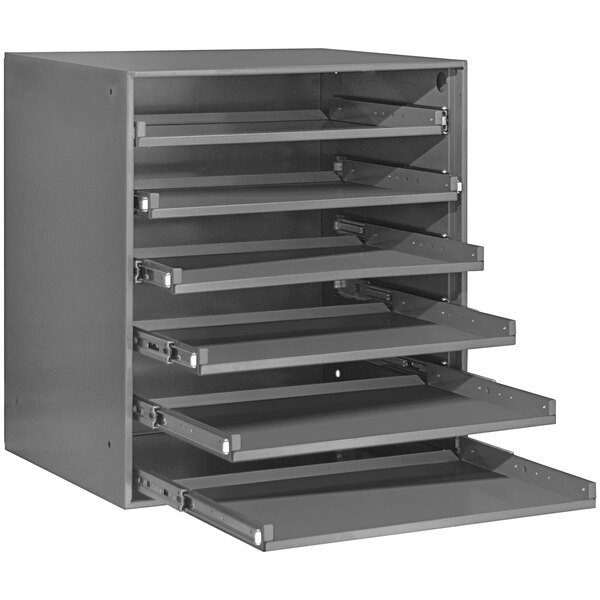 A gray metal Durham Mfg bearing slide rack with 6 compartments.
