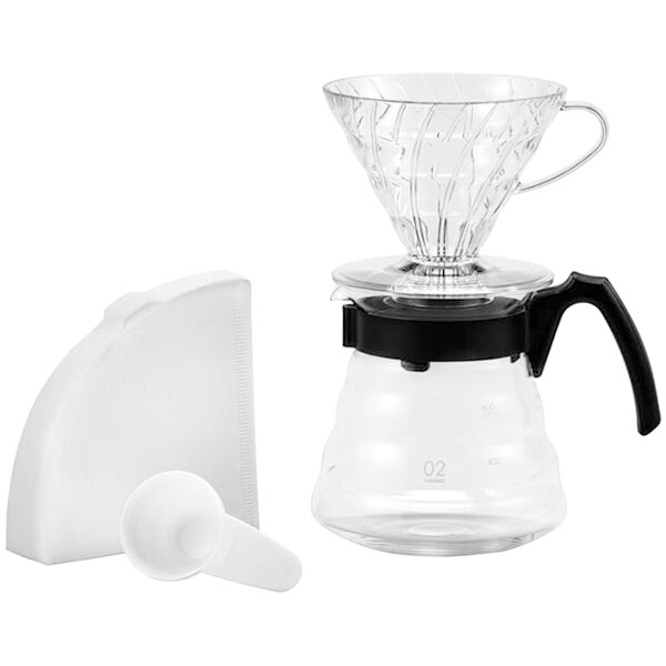 A clear plastic Hario V60 coffee maker with a clear glass server and black lid.