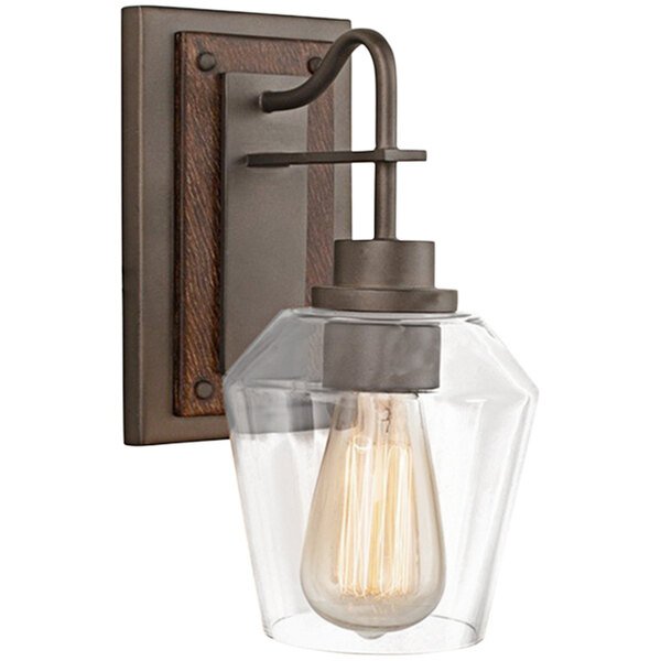A Kalco Allegheny wall sconce with a clear glass shade.