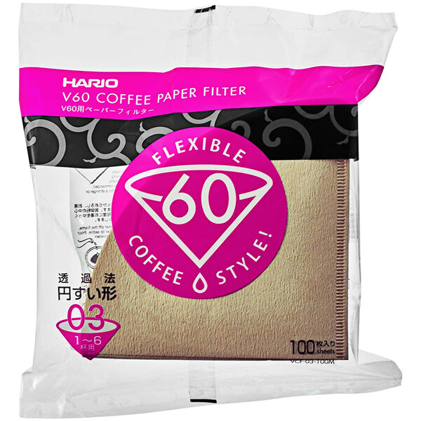 A package of Hario V60 natural paper coffee filters with a pink label.