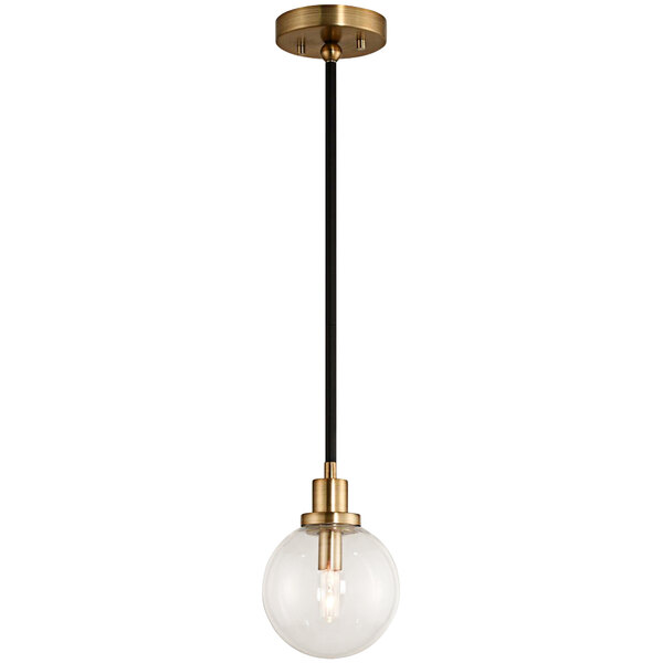 A Kalco Cameo pendant light with a clear glass globe and brass accents on a black cord.
