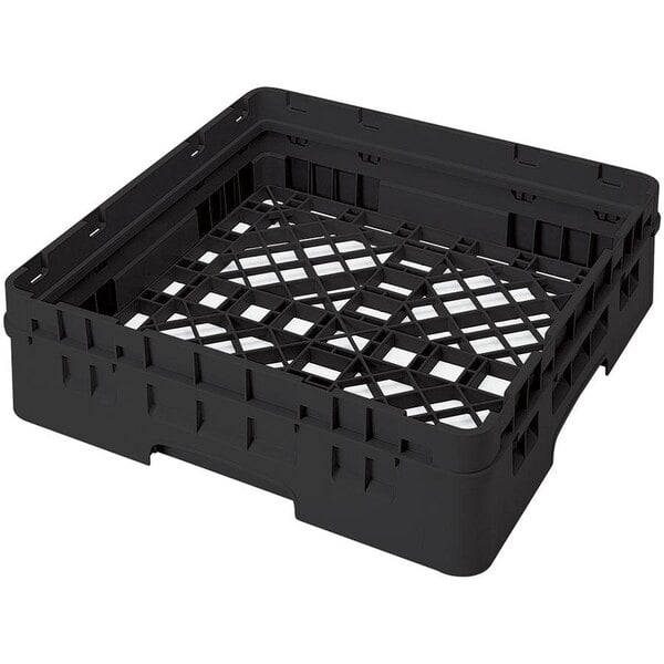 A black plastic Cambro dish rack with closed sides and white square mesh.