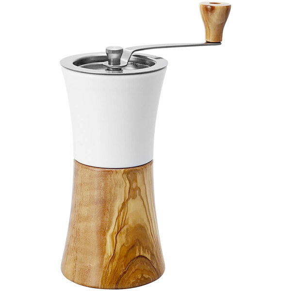 A white and wood Hario manual coffee mill with a wooden handle.
