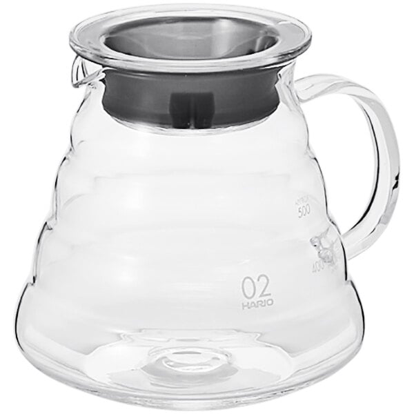 A clear glass Hario coffee server with a black lid and handle.