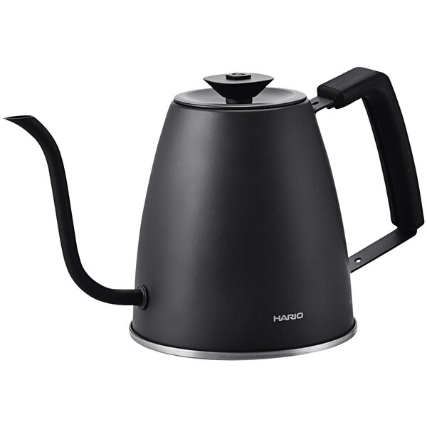 A black kettle with a long handle.