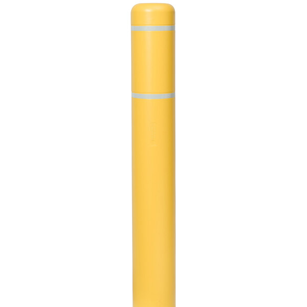 A yellow cylindrical bollard cover with white stripes.