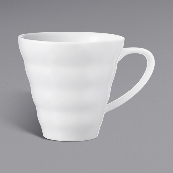 A white Hario V60 ceramic mug with a handle.