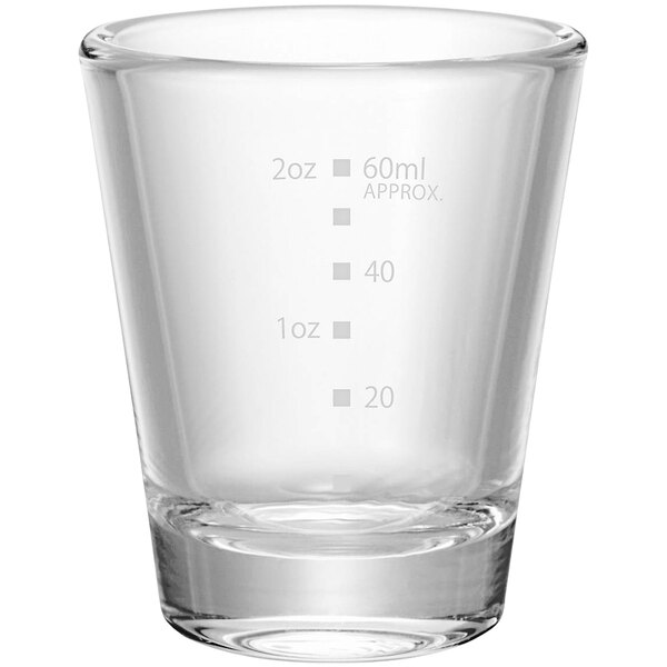A clear glass Hario shot glass with measurements on it.