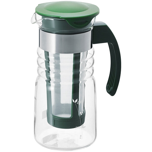 A dark green glass Hario Mizudashi cold brew tea infuser with a lid and handle.