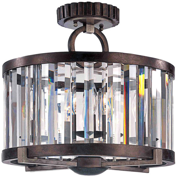 A Kalco Foster semi-flush mount light with clear glass tubes.