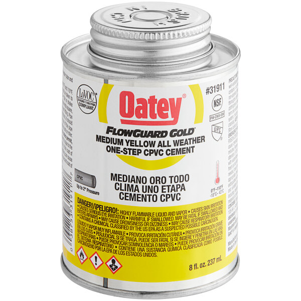 A can of yellow Oatey CPVC cement.