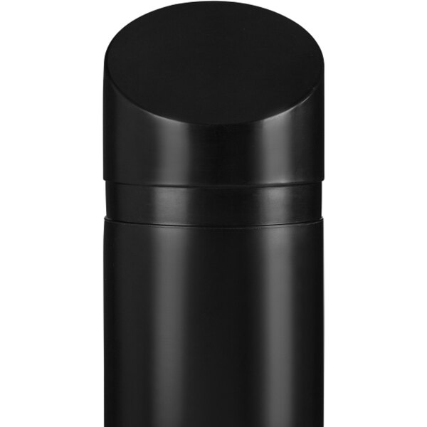 A black container with a round top.