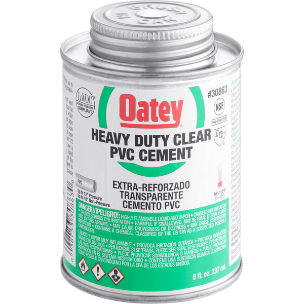 An 8 oz. can of Oatey heavy-duty clear PVC cement with a white label.