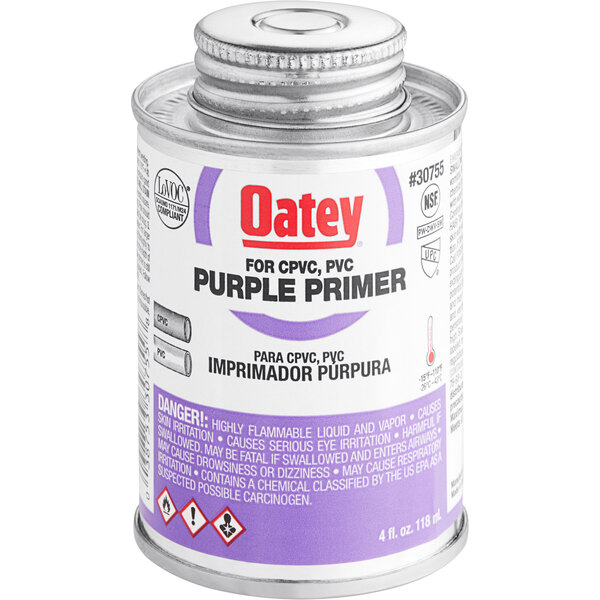 A can of Oatey purple primer for PVC/CPVC pipe and fittings.