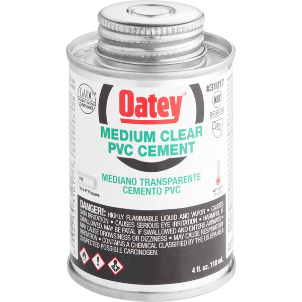 A white can of Oatey medium clear PVC cement.