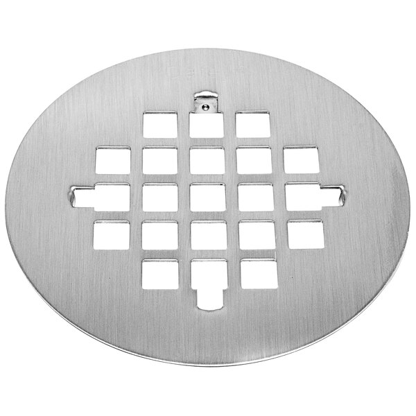 A silver circular Oatey shower drain strainer with holes.