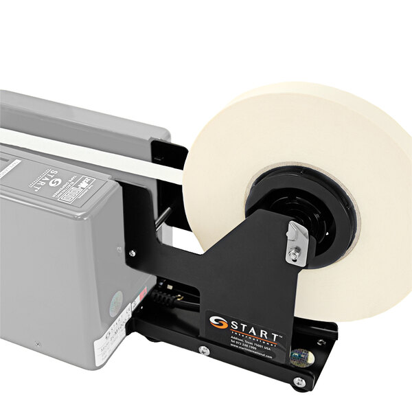 A Start International ZCM Series tape dispenser on a printer with a white tape roll on it.