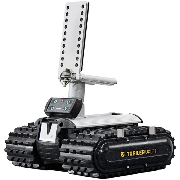 The black and white Trailer Valet RVR3 remote-controlled trailer dolly with wheels and a remote control.