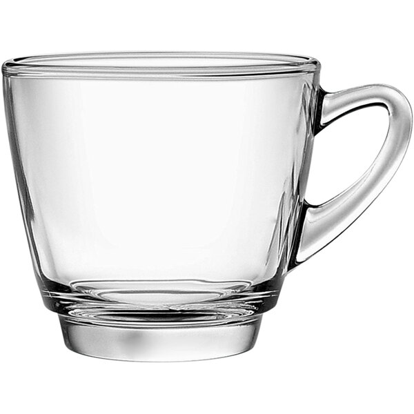 A Kenya clear glass cappuccino cup with a handle.