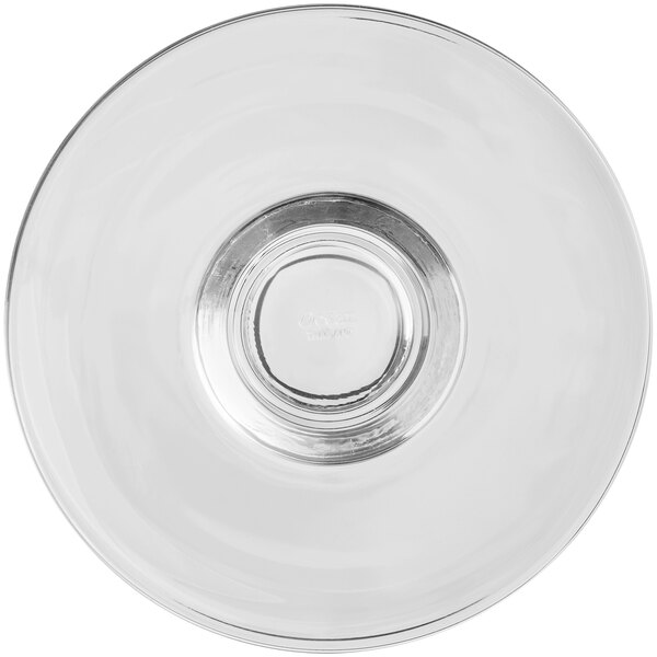 A clear glass saucer with a ring.